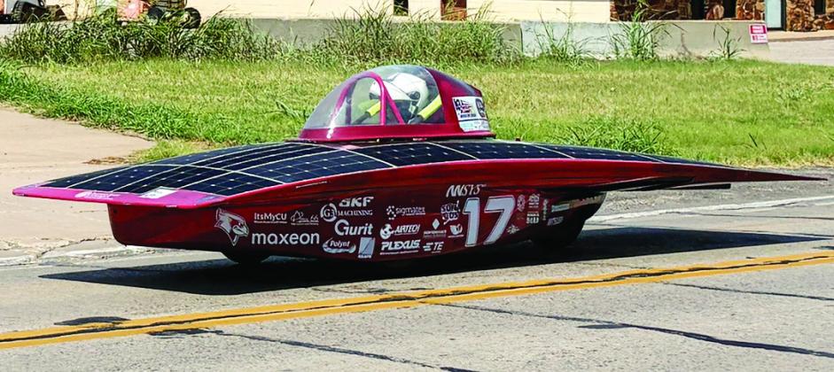 The Illinois State solar car traveling Friday along Route 66 on the Interstate 40 service road. CDN | Christian Jacobsen