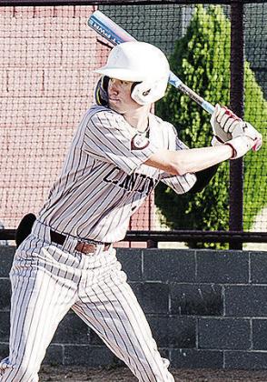 Jeter King focuses on the pitcher as he prepares for the ball to be thrown his way. CDN | Sam Goodwyn