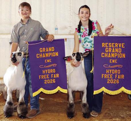 Arapaho-Butler siblings Dustin Moore, left, won Grand Champion Ewe honors at the Hydro Free Fair and Tinley Moore won Reserve Grand Champion Ewe in addition to Senior Division Showman honors. CDN | Courtesy photo