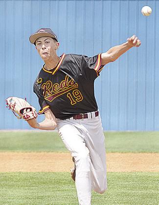 Clinton’s Conner Meget hurls the ball from the mound during the Reds’ game Friday against the Indians. CDN | Sam Goodwyn