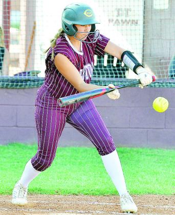 Clinton’s Hadley Meget bunts for a single during the Lady Reds’ home win against Bishop McGuiness Tuesday. CDN | Sam Goodwyn