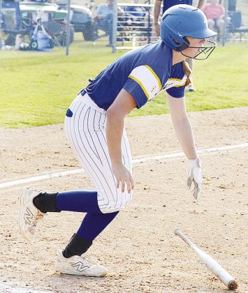 A-B’s Kelsey Garibay throws her bat down as she hustles out of the batter’s box after hitting the ball Monday against the Hydro-Eakly Lady Bobcats. CDN | Sam Goodwyn