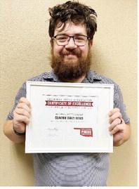 In the photo at left, three Clinton Daily News staffers were honored for 25 years of service in the newspaper industry. From left are Sean Stephens, Eric Hunter, and Calvin Stone. At right, Sports Editor Sam Goodwyn shows off his award for placing third i