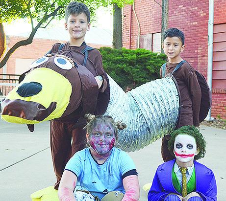 In the 8-year-old category, Giancarlo and Gianlucca Coutin, won first place as Slinky Dog. Zoey Keith, won second place as a zombie, and Julian Taplin, won third place as Joker from the Dark Knight.