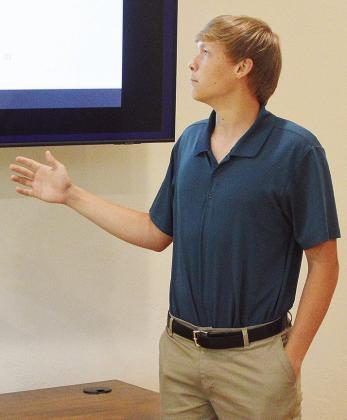 Ben Christie gives a presentation as part of his internship with GIBCO Capital Advisors. CDN | Micah Ashcraft
