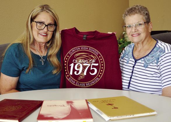 Clinton High School Class of 1975 alumnae, Rhonda Scott, left, and Carla Moore, show the T-shirt being offered this weekend in conjunction with their reunion plans. CDN | Staff Photo