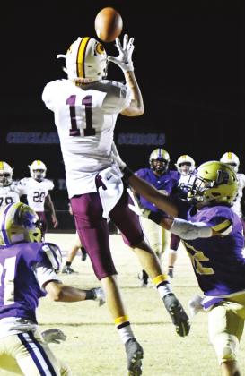 CDN | John Kinsey Clinton seniors Dalton Denney, No. 7 in left photo, and Ty Newcomb, No. 11 in right photo, made the K101 Classic Bowl west roster. Denney started at defensive end for the Reds in the fall, compiling 46 tackles, seven tackles for loss, th