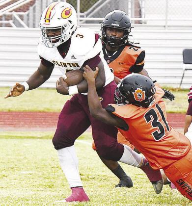 Clinton dominates Douglass in bad weather