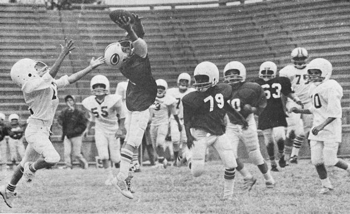 40 YEARS AGO Leaping high into the air, Damon Green intercepted a pass intended for Derek Stratton in a Clinton pee wee football game. Other players pictured from left, include Stewart Burrell, P.J. Kemp, Timmy Collins, Orlando Williams, Bryan Vince and B
