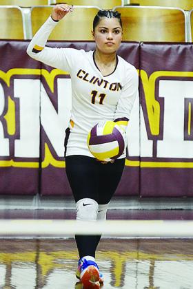 Clinton’s Karol Bonilla prepares to serve the ball during the Lady Reds’ home game against Weatherford. CDN | Sam Goodwyn