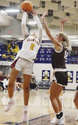 No. 2 Ella Redshin goes up for a layup attempt over the Elk City defender during Clinton’s Class 4A Regional Tournament basketball game against the Elkettes Friday in Kingfisher. CDN | Sam Goodwyn