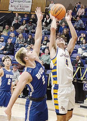 A-B’s Kaden Waldrop goes up for the layup while a BF-DC defender guards him Friday during the Indians’ home game. CDN | Sam Goodwyn