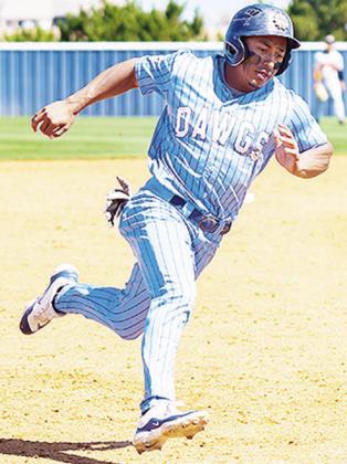 SWOSU’s Gage Gaunt rounds third in the Bulldogs’ game against East Central University. CDN | Courtesy photo