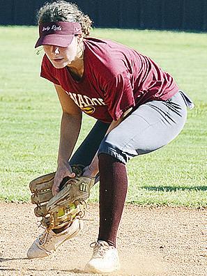 Clinton’s Reece Giblet collects the ball hit toward her before she throws it to first during practice Thursday. CDN | Sam Goodwyn
