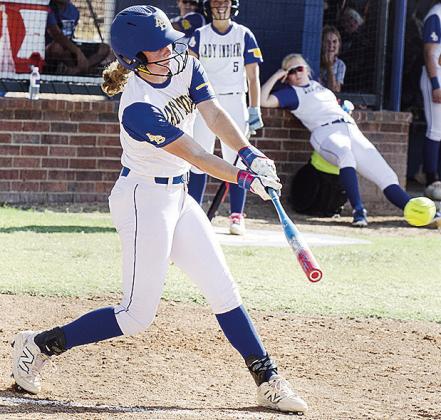 Arapaho-Butler’s Dalaynie Lee blasts the ball to the outfield during the Lady Indians’ blowout win Thursday at home over Arnett. CDN | Sam Goodwyn