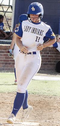 No. 11 Peyton Lambeth crosses homeplate for a run during A-B’s home win over Arnett. CDN | Sam Goodwyn