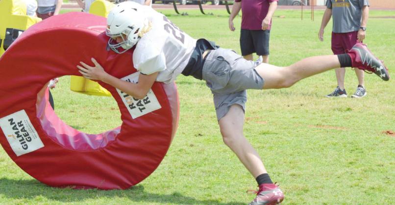 Clinton opens spring practice with energy jolt
