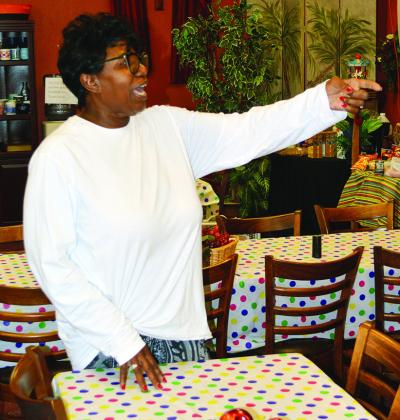 Pastor Wilma Jackson shows the dining area for the new soup kitchen at H.O.S.T. Ministries Church in Clinton. CDN | Christian Jacobsen