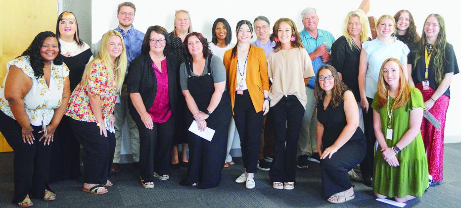 The newest teachers of Clinton Public Schools, front from left, CHS Spanish teacher Mikaela Davidson, kindergarten teacher Libby Gregston, CMS counselor Lana Nix, CMS special ed teacher Lisa Ray, CMS English teacher Gabby Spieker, Washington science and s