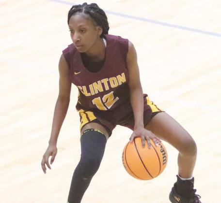 Jefferson joins 1,000-point club, Lady Reds take consolation crown