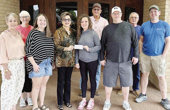 From left, Debbie Avery, Susan Klein, Natalie Vowell, Canda Dupree, Jennifer Lee, Sam Shelton, Brad McBride, Troy Lee and Trey Arney after the Cumberland Presbyterian Women’s group recently donated $500 to the Mission House Food pantry from the proceeds