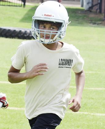 CDN | Sam Goodwyn Tradarius Hester hustles down the field during the Clinton Whirlwinds’ practice last week at the middle school.