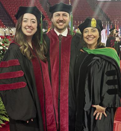 From left, Dr. Laramie Knapp, Dr. Gavin Knapp, and Dr. Stacy Knapp pose during the University of Oklahoma’s recent graduation. Stacy, as a practicing physician and by the tradition of welcoming a new physician to the profession, was able to “hood” her son Gavin, who was then able to “hood” his wife Laramie. CDN | Courtesy photo