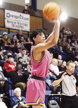 Arapaho-Butler’s D’Shawn Washee shoots a three Friday during the Indians’ home game against the Chieftains. CDN | Sam Goodwyn