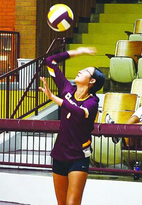 No. 1 Rihanna Ellis keeps her eyes on the ball as she serves it during Clinton’s home match against Weatherford. CDN | Sam Goodwyn
