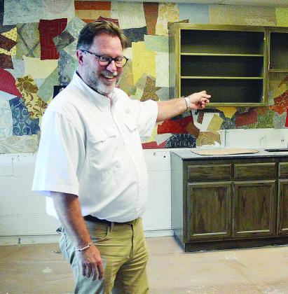 Brian Aneshansley describes the layout of the future room in which NAPA will make hydraulic and AC hoses in the new NAPA Auto Parts store at 701 W. Gary Blvd. CDN | Christian Jacobsen
