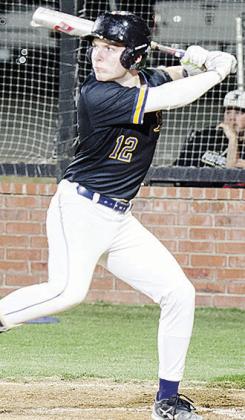 CDN | Sam Goodwyn No. 12 Beckett Southall gets into his stance as he prepares for the pitch during A-B’s game against Fletcher.