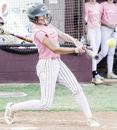 Clinton’s Reese Giblet sends the ball flying during the Lady Reds’ home game Monday against Binger. CDN | Sam Goodwyn