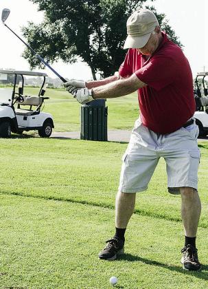 Mike Rollins begins his swing as he plays a round of golf at Riverside Golf Course. CDN | Sam Goodwyn