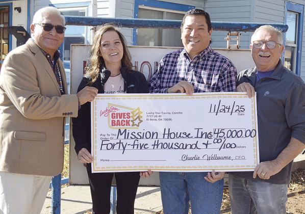 From left, Lucky Star Casino Chief Executive Officer Charlie Welbourne, Clinton Mission House Director Jennifer Lee, Cheyenne and Arapaho Tribes Gov. Reggie Wassana, and Clinton Mission House Board President Troy Lee stand together as Lucky Star Casino pr