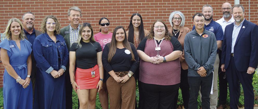 Front left, Robyn Randol, Marla Pankratz, Astrid Olguin, Kaylah Anderson, Sarah Dean, Devon Mitchell; back, Southwestern Oklahoma State University Dean of Education and Behavioral Sciences Ed Klein, Oklahoma CareerTech Director of Workforce Training Max M