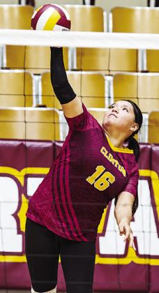Clinton’s Mallory Burns serves the ball during the Lady Reds’ home game Tuesday against Lawton Eisenhower. CDN | Sam Goodwyn