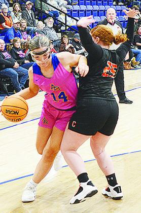 A-B’s Peyton Lambeth fights through a block during the Lady Indians’ game against Calumet. CDN | Sam Goodwyn