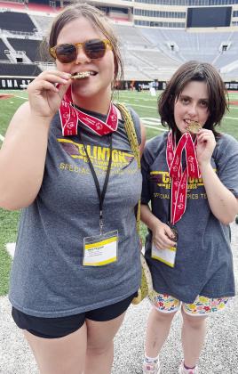 Olivia Campbell, left, and Jade Hall celebrate their gold medals after competing in the unified bocce ball event during the Special Olympics State Games at OSU. CDN |Courtesy Photo