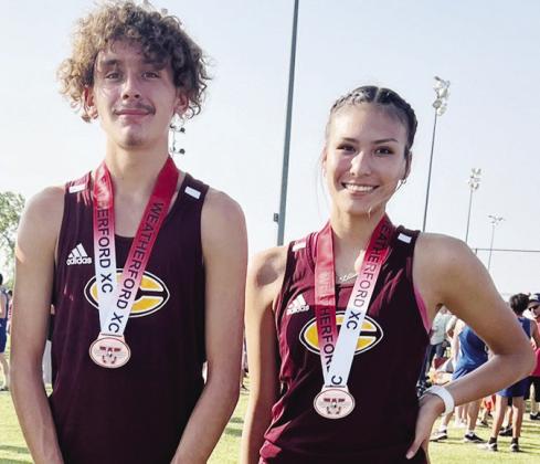 Two Red Tornado runners race to state