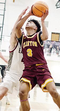 No. 3 Titan Malone fights through a Weatherford defender Tuesday as he drives for a layup. CDN | Sam Goodwyn