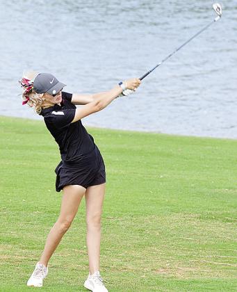 Clinton’s Addyson Littke hits the ball during the Class 4A State Tournament last year in Shawnee. CDN | Sam Goodwyn