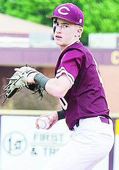 Axl Deatherage stares down the batter as he goes into his wind up to pitch during Clinton’s game against Elk City Tuesday prior to the weather forced it to pause. CDN | Sam Goodwyn