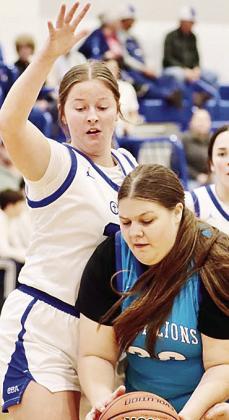 No. 35 Kate Stewart, left, guards against a player during a home game. CDN | Courtesy photo
