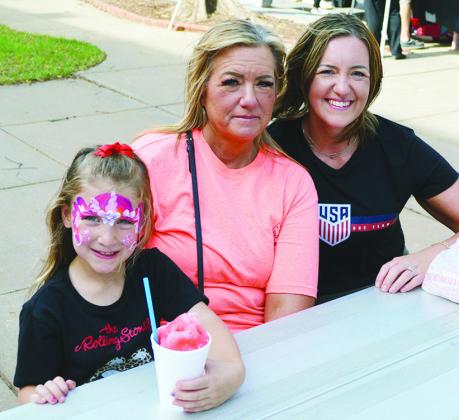 From left, Tayler Poe, Kristi Martinez, and Shanna Poe visit the Farmer’s Market Thursday at Engleman Park.