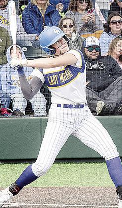 Kelsey Garibay stiffens as she prepares to swing at the ball during one of the Class 3A Slow-Pitch Softball State Tournament Games. CDN | Sam Goodwyn