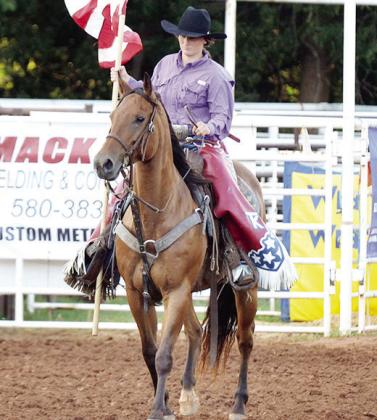 Shelby Miller rides her horse into the Round-Up Arena prior to the beginning of the rodeo. CDN | Sam Goodwyn
