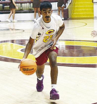 Joseph Nava dribbles the ball up the court during the Clinton boys’ JV game against Elk City Tuesday at the Tornado Dome.