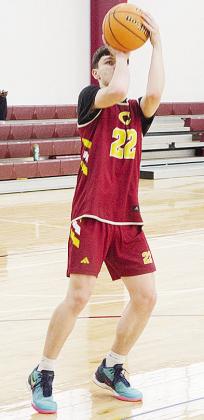 Clinton’s Davien Stanley plants his foot as he attempts to the shoot the ball during basketball practice. CDN | Sam Goodwyn
