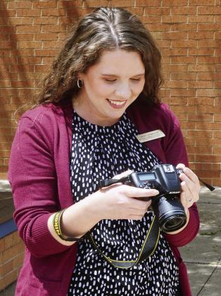 Marketing and Communications Director Lacey Lewallen takes photos to be posted on the WTC website. CDN | Christian Jacobsen