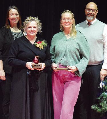 From left, Clinton Public Schools Asst. Supt. Melissa Knabe, CPS Teacher of the Year recipient Ginger England, CPS Support Staff of the Year recipient Sheffield Southall, and CPS Supt. Nathan Meget stand together during the Clinton Teacher of the Year rec